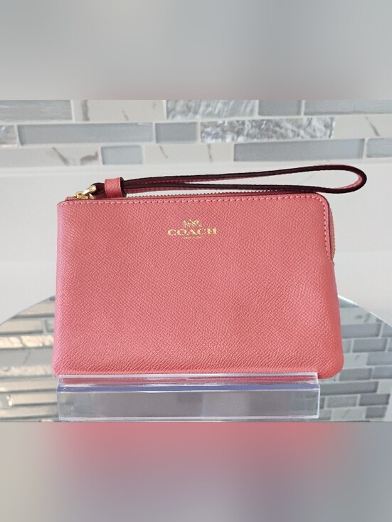Coach Handbags - EUC COACH Leather Wristlet - Coral Pink w/GHW